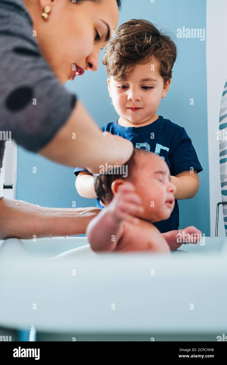 Woman in warm bath with newborn hires stock photography and images Alamy