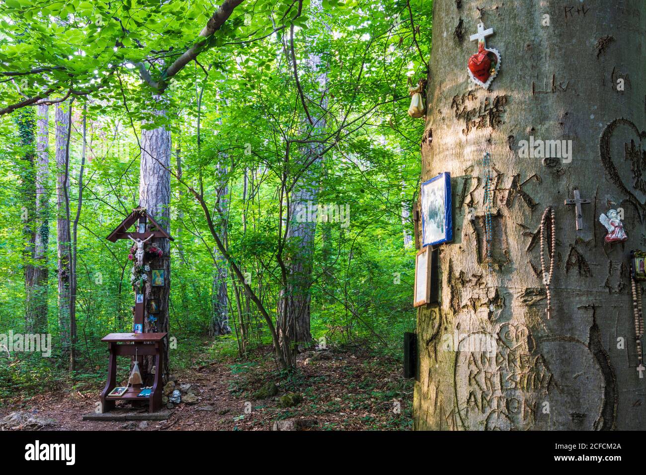 Baden, Place of worship Waldandacht (Forest devotion) with crucifix and christian symbols in Wienerwald, Vienna Woods, Niederösterreich / Lower Stock Photo