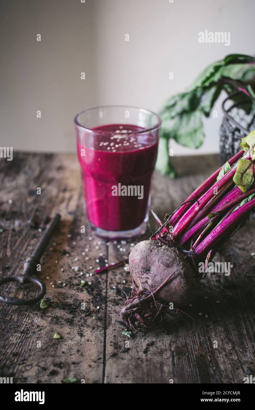 Beetroot and fresh smoothie on wooden table Stock Photo