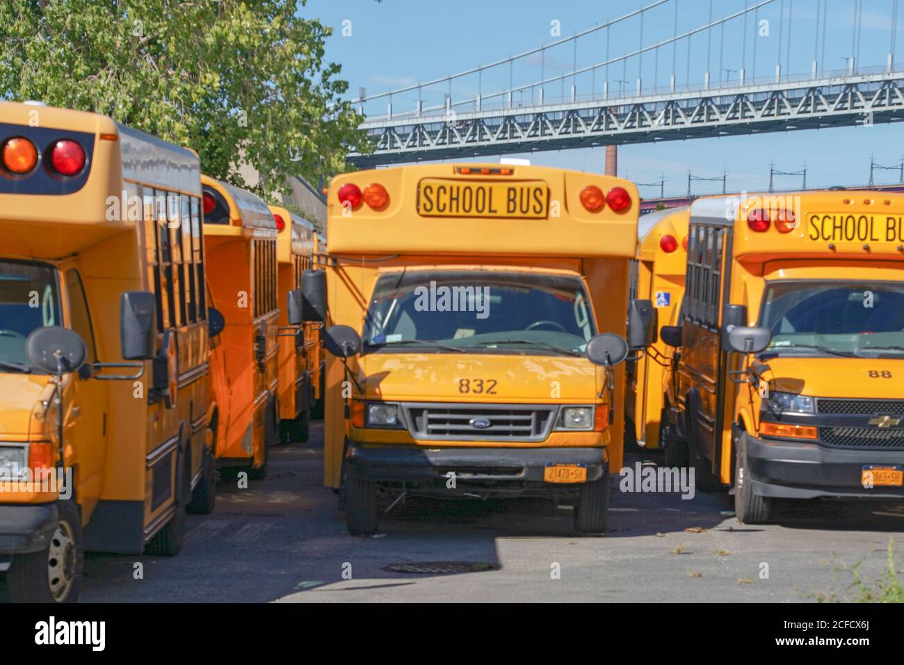 NEW YORK, NY - SEPTEMBER 04: New York yellow school buses sit vacant in a parking lot in the borough of Queens on September 4, 2020 in New York City. Stock Photo