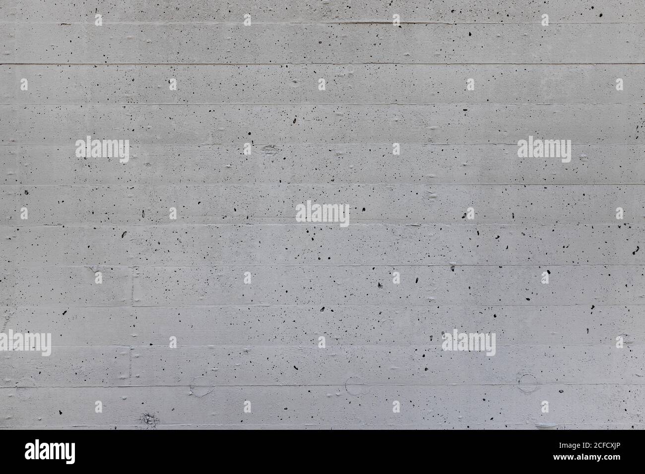 Wall made of gray exposed concrete Stock Photo