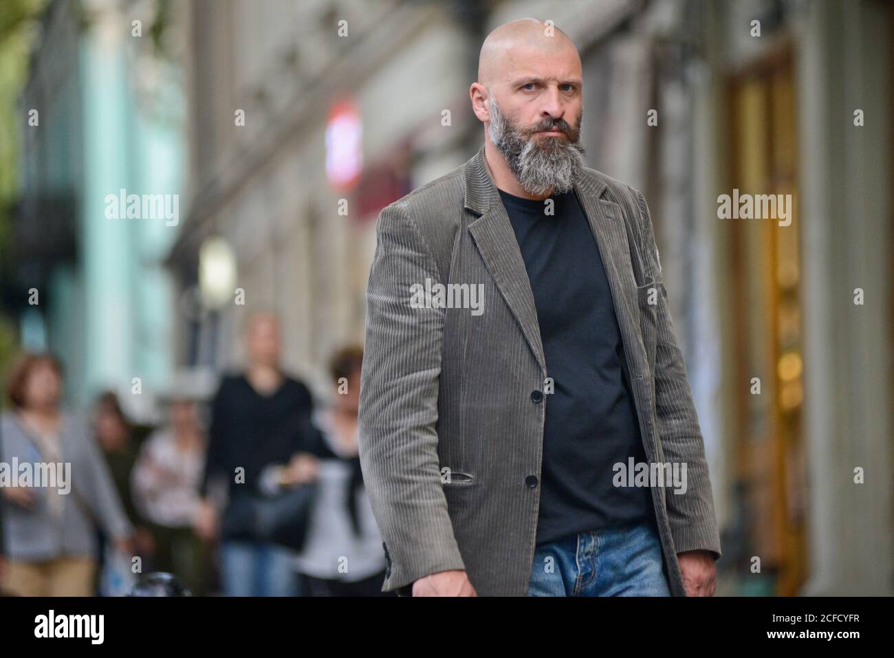 Georgian man walking in Shota Rustaveli Avenue, Tbilisi, Georgia Stock Photo