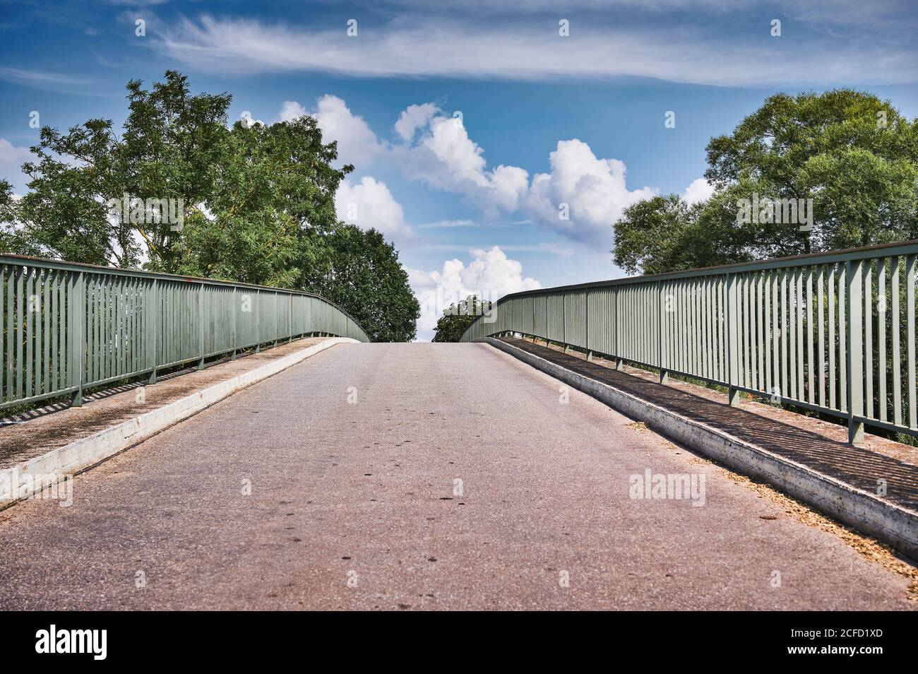 Symbolic picture, direction, where does the path lead, view to the apex of a bridge, symmetry of the picture Stock Photo
