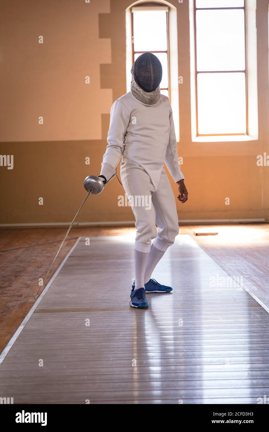 Woman wearing fencing outfit Stock Photo Alamy