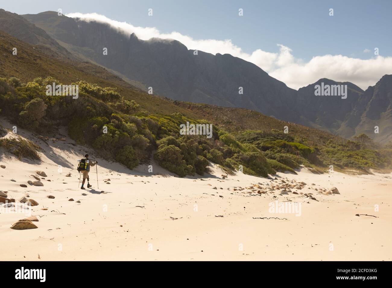 Long shot of disabled male athlete walking Stock Photo