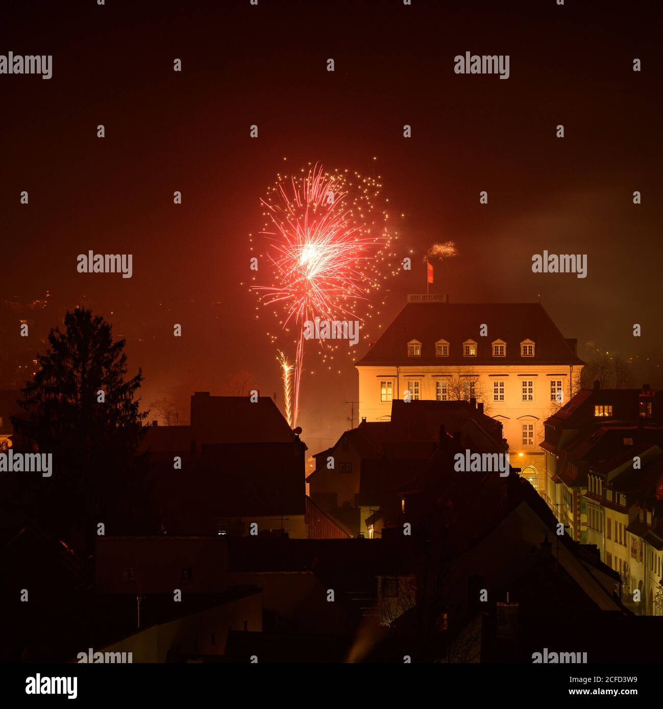 Germany, Baden-Württemberg, Karlsruhe, New Year's Eve in the Durlach district, fireworks at the Karlsburg. Stock Photo