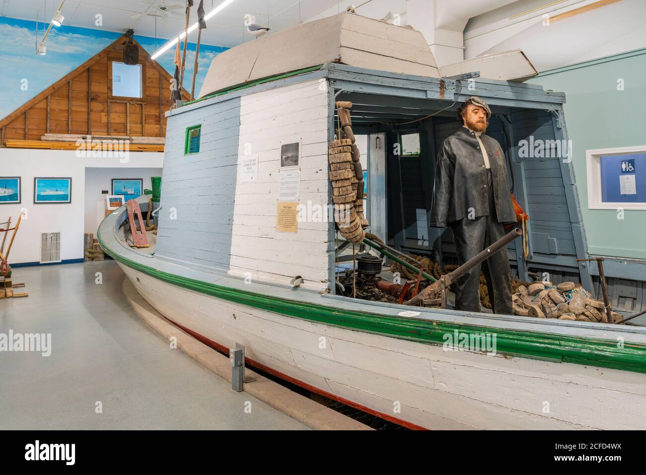 A fishing boat exhibit inside the Tourist Information building in Gimli, Manitoba, Canada. Stock Photo