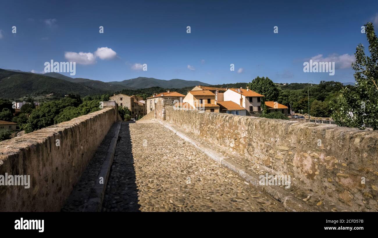 Le Pont du Diable over the Tech river at Céret. The single-arch stone bridge was built in the XIV century and its only arch is 45 meters wide. Stock Photo