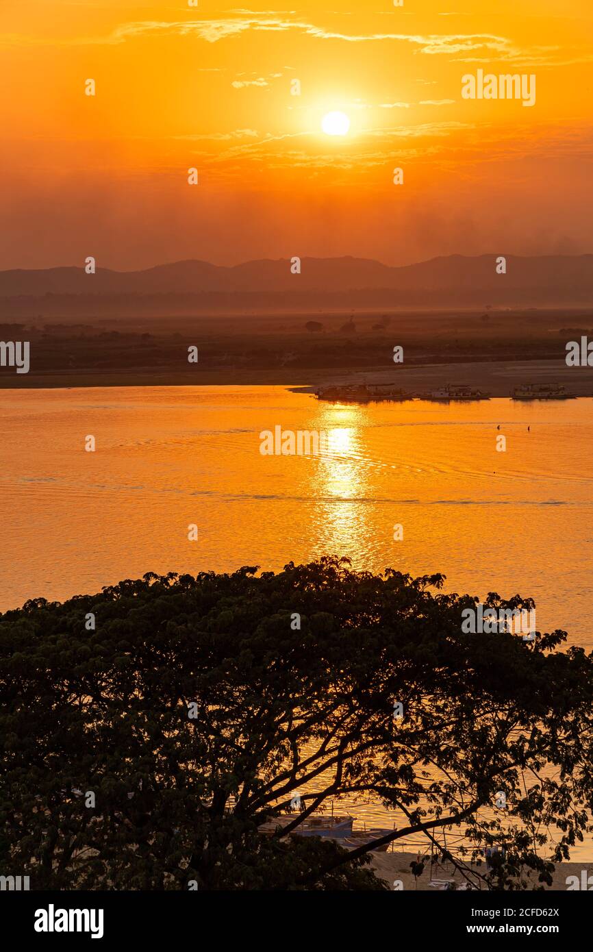 Sunset over the Ayarwaddy River, Mandalay, Myanmar Stock Photo