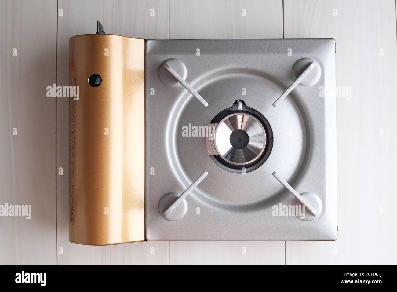 Small 1200w portable gas camping stove isolated on a white background Stock  Photo - Alamy