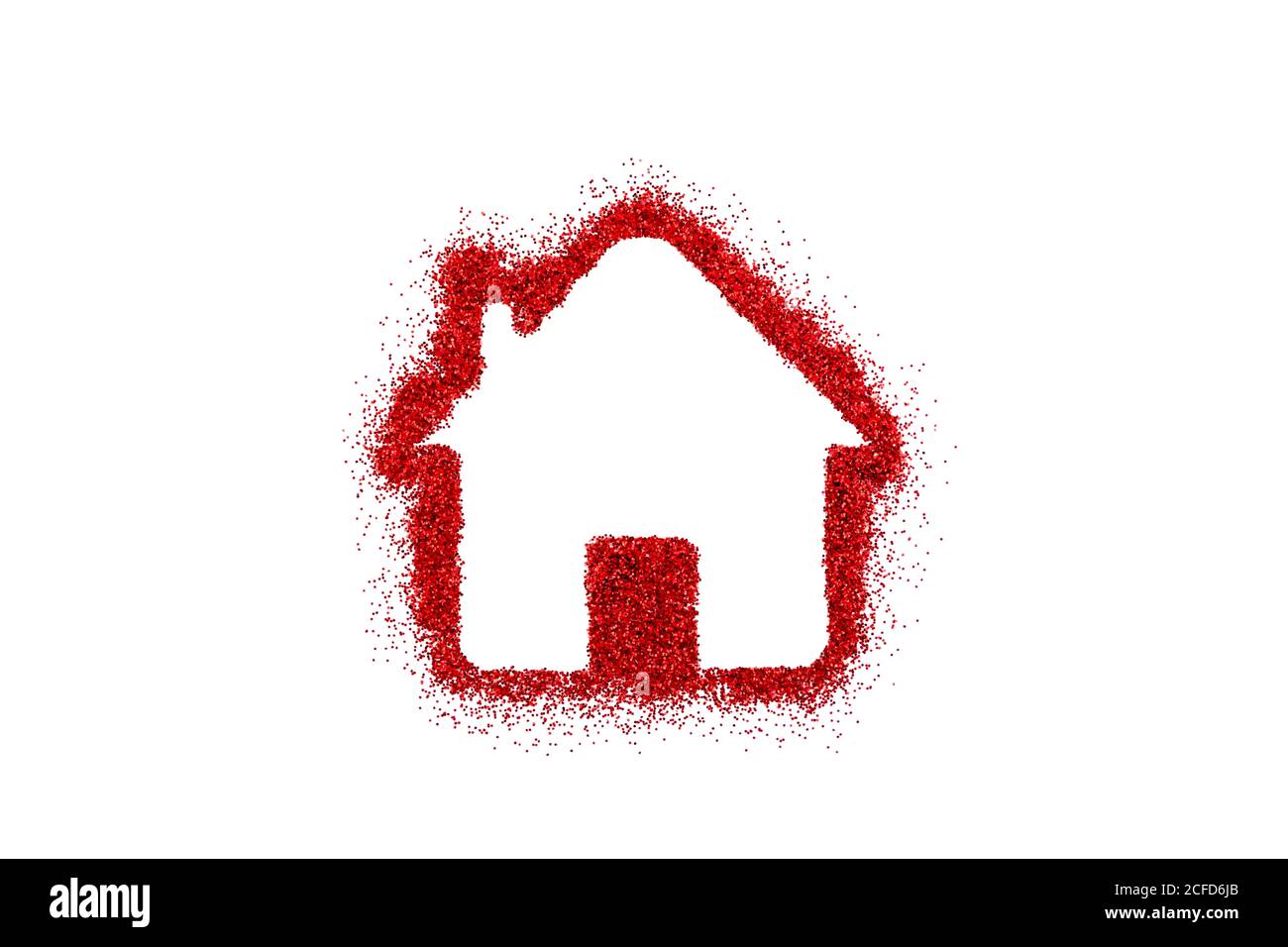 Small house shape on red glitter isolated on white background Stock Photo