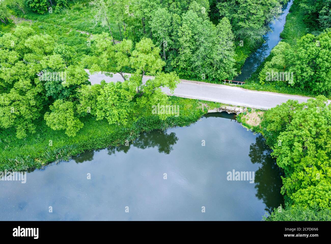 20200607 DJI 0945 beautiful rural landscape with lake and country road in summer time. aerial drone photo Stock Photo