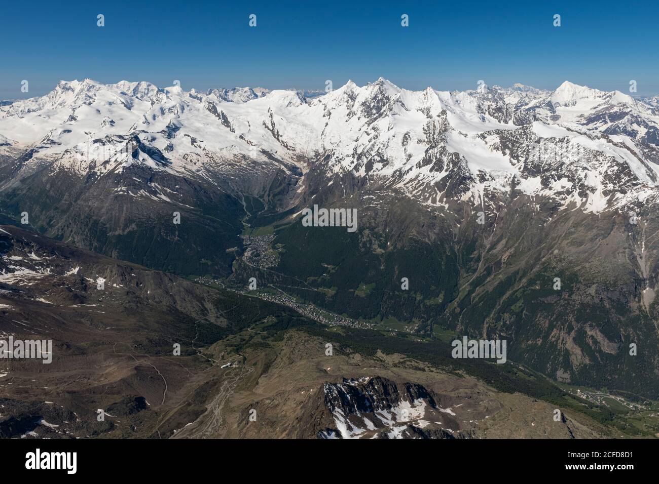 Switzerland, Canton Valais, Saas Valley, Saas-Fee with a view of Monte Rosa, Liskamm, Castor, Pollux, Breithorn, Strahlhorn, Rimpfischhorn, Stock Photo
