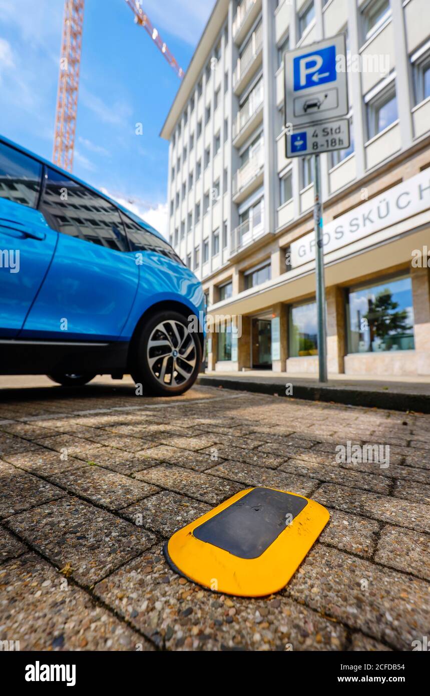 Parking sensors show the Smart Poles free parking spaces, Smart Poles are intelligent street lights, are parking attendants, free charging station Stock Photo