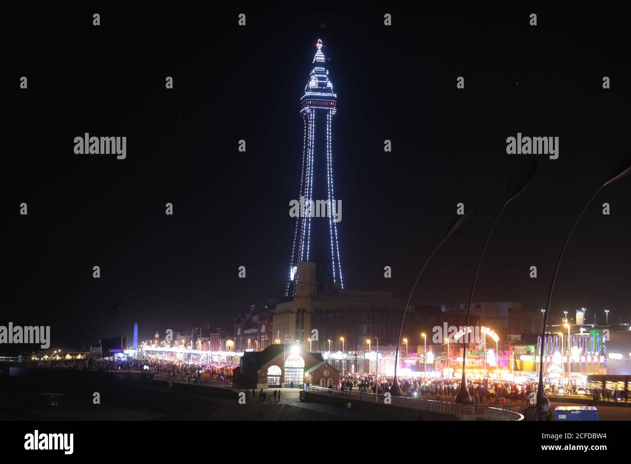 Blackpool Tower lit up on the first day of the annual lights display in the north west England seaside resort. This year the lights will remain on display until January, two months longer than normal, to help boost the tourism trade which has been hit by the Covid-19 pandemic. Stock Photo
