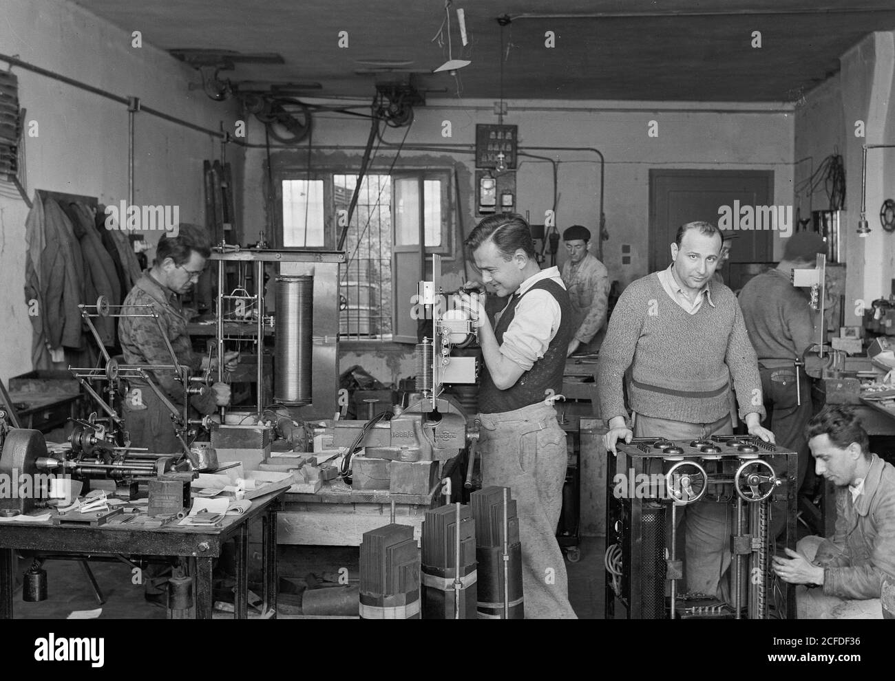 Middle East History - Jewish factories in Palestine on Plain of Sharon & along the coast to Haifa. Tel Aviv. Complicated electrical appliances factory Int[erior] Stock Photo