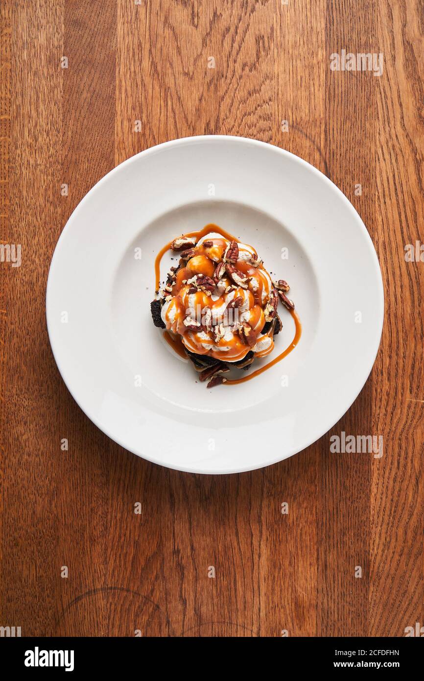 Stylish desserts with brownie and caramel Stock Photo