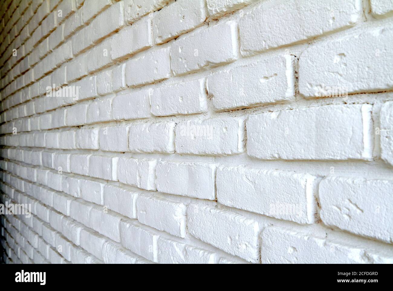 White brick wall with shadows, texture background Stock Photo