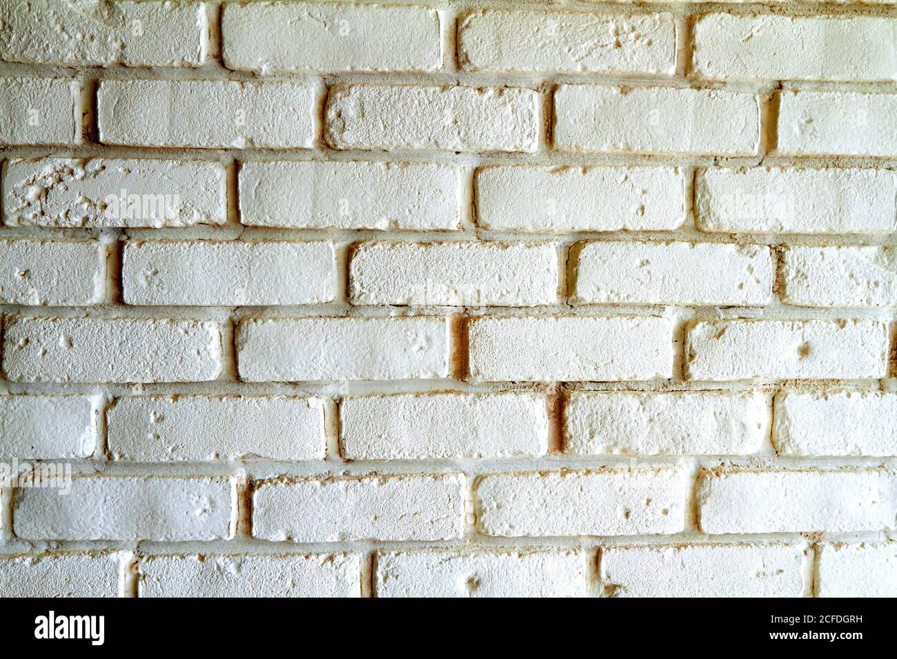 White brick wall with shadows, texture background Stock Photo