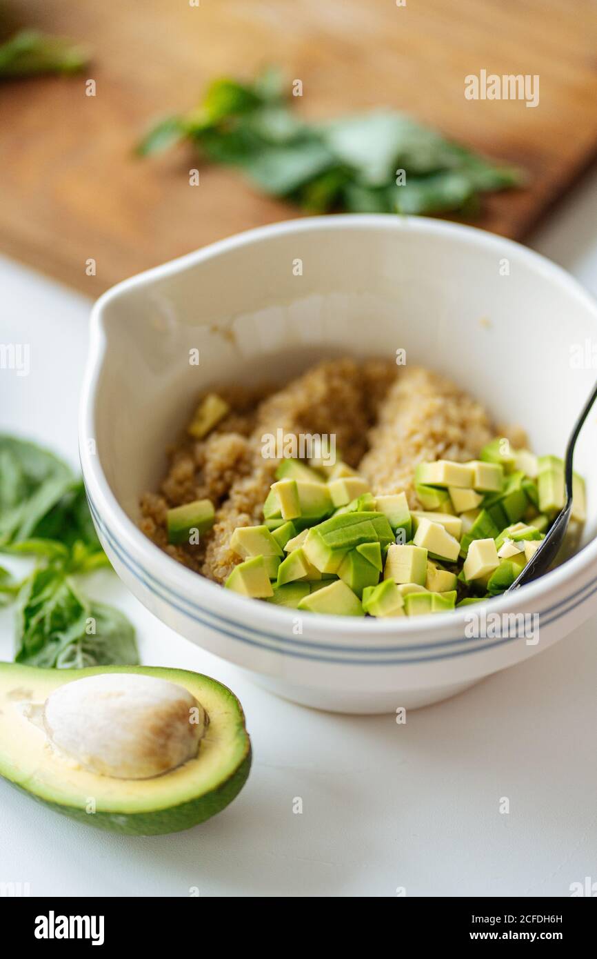 Bowl with quinoa and avocado Stock Photo