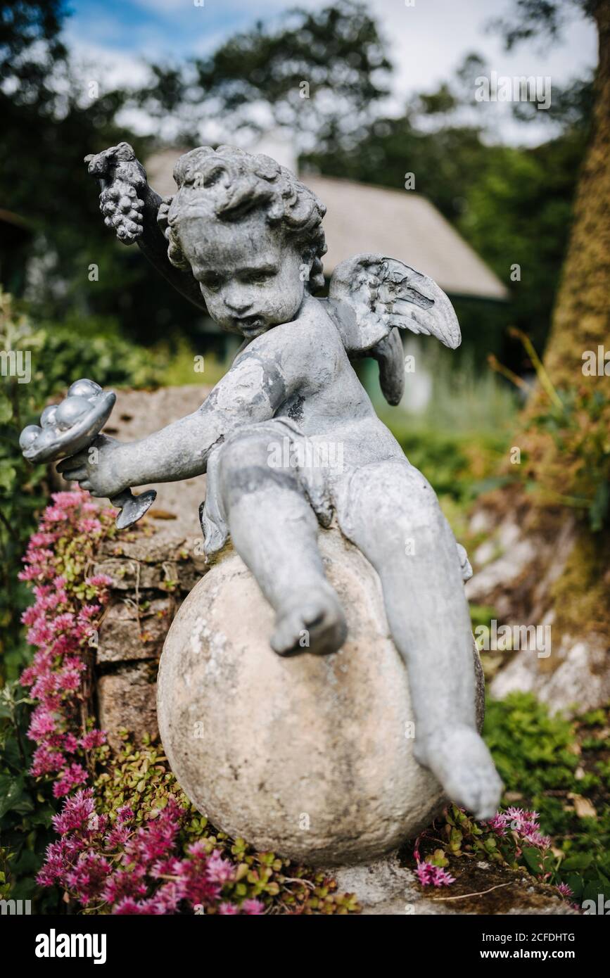 Garden sculpture cherub hires stock photography and images Alamy