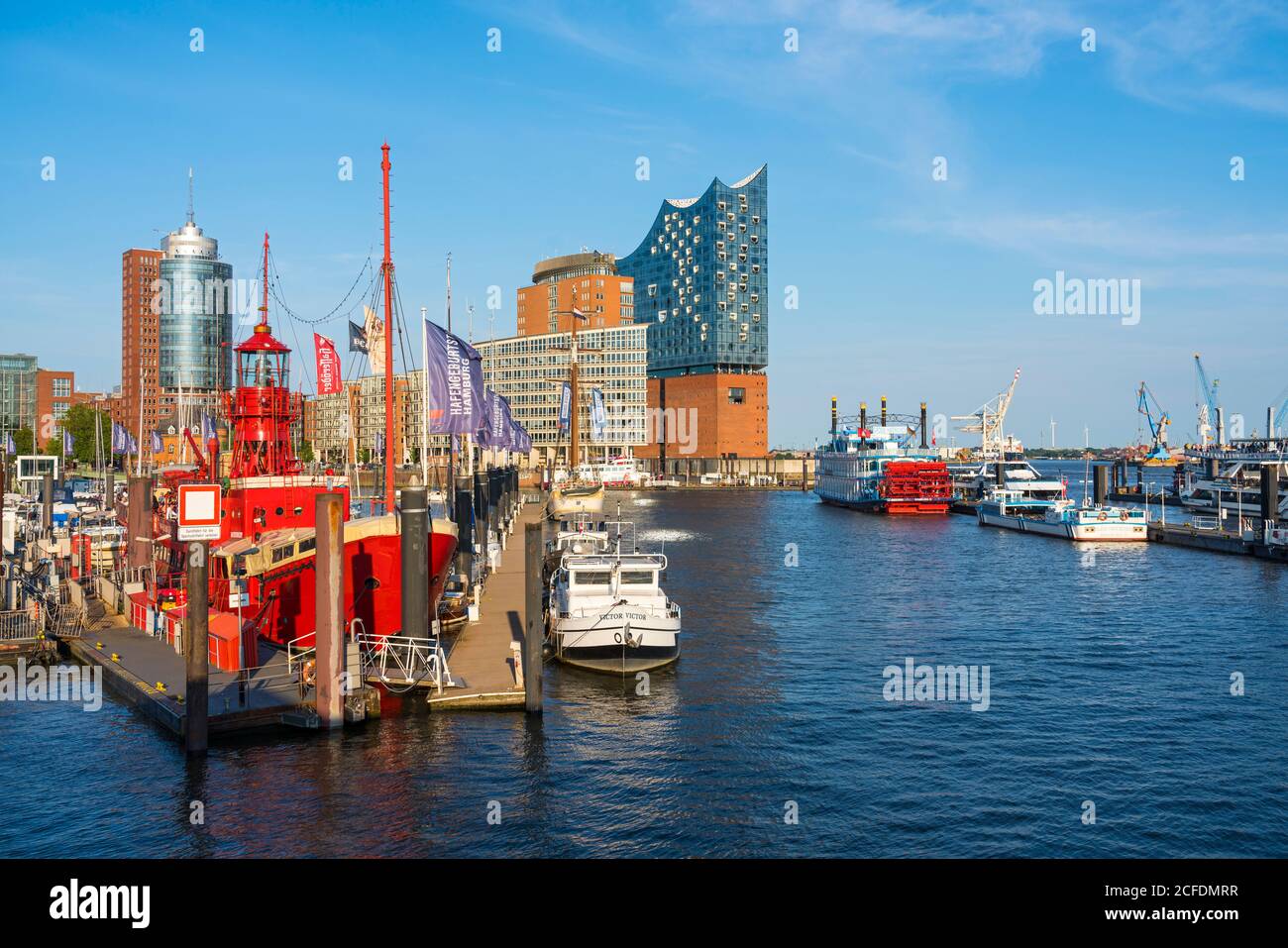 Germany, Hamburg, view from the Übersebrücke over the Niederhafen to the Elbphilharmonie, on the left restaurant Feuerschiff LV 13, on the right Stock Photo