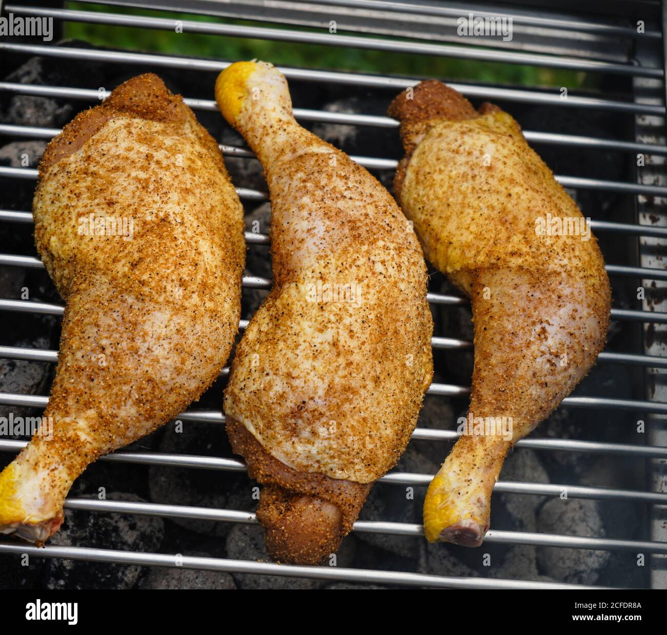 spicy chicken drumsticks on the grill Stock Photo Alamy