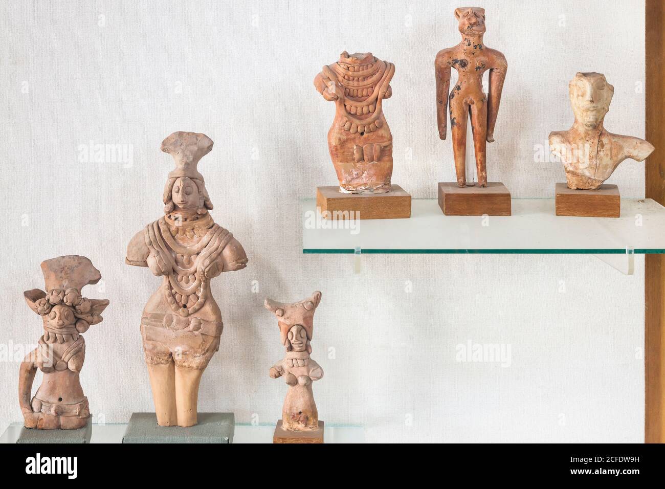 Display of ancient clay figurines, Indus valley civilization Gallery, National Museum of Pakistan, Karachi, Sindh, Pakistan, South Asia, Asia Stock Photo