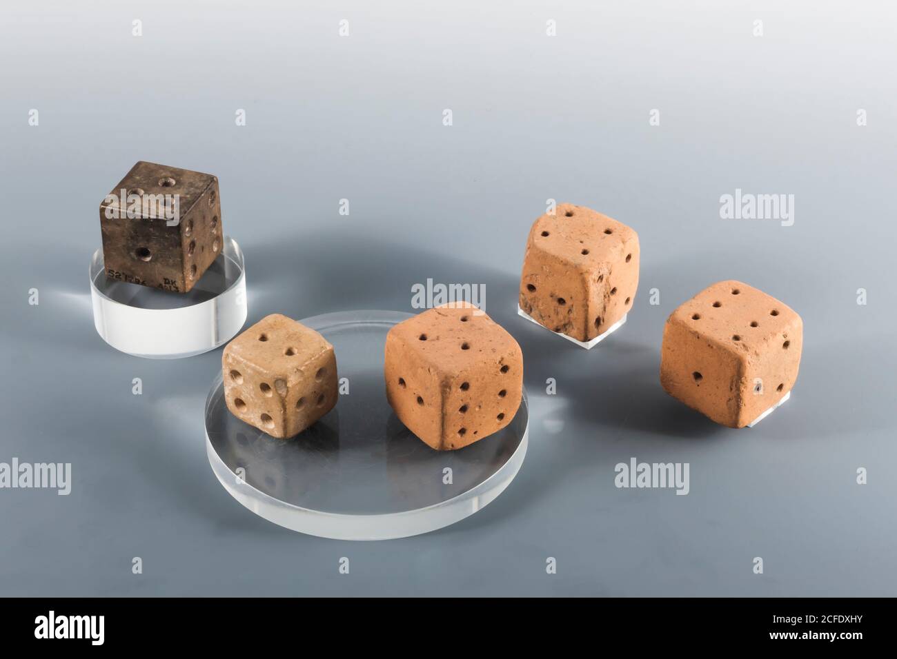 Oldest Clay and stone dice, Mohenjo daro, Indus valley civilization Gallery, National Museum of Pakistan, Karachi, Sindh, Pakistan, South Asia, Asia Stock Photo