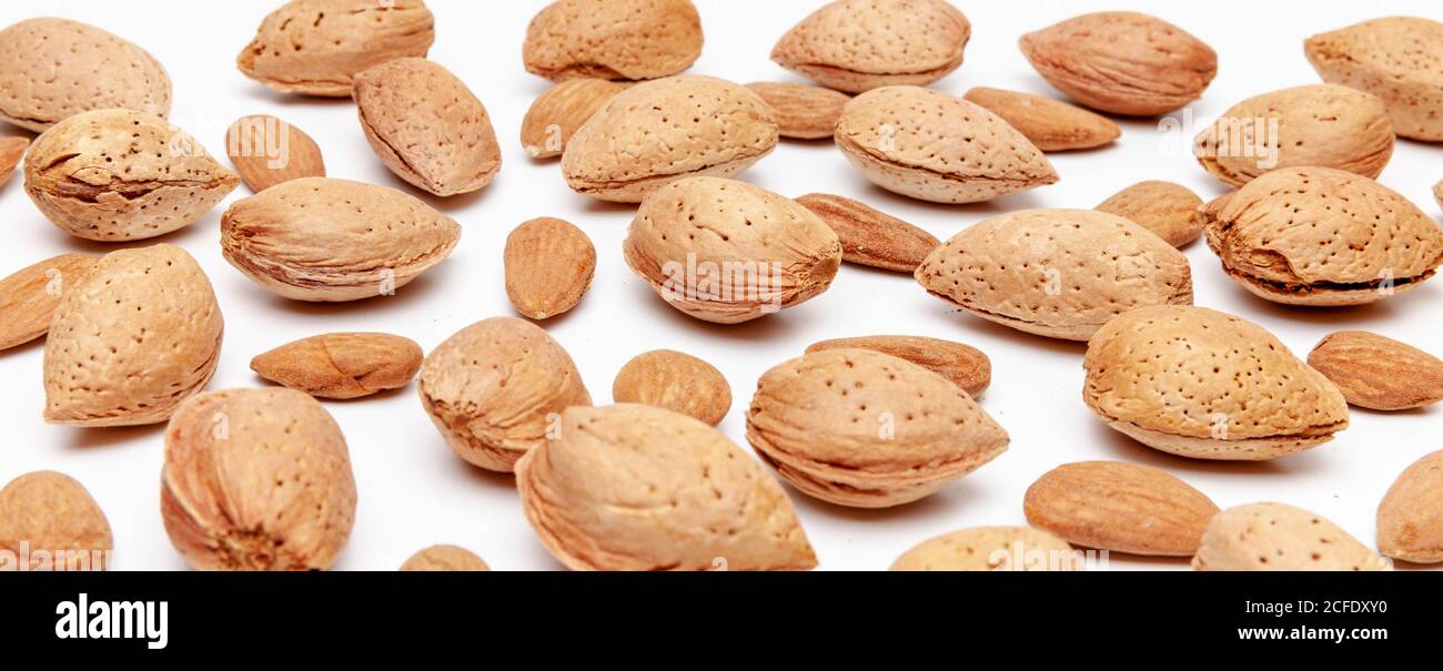 Almonds with and without skin Stock Photo Alamy