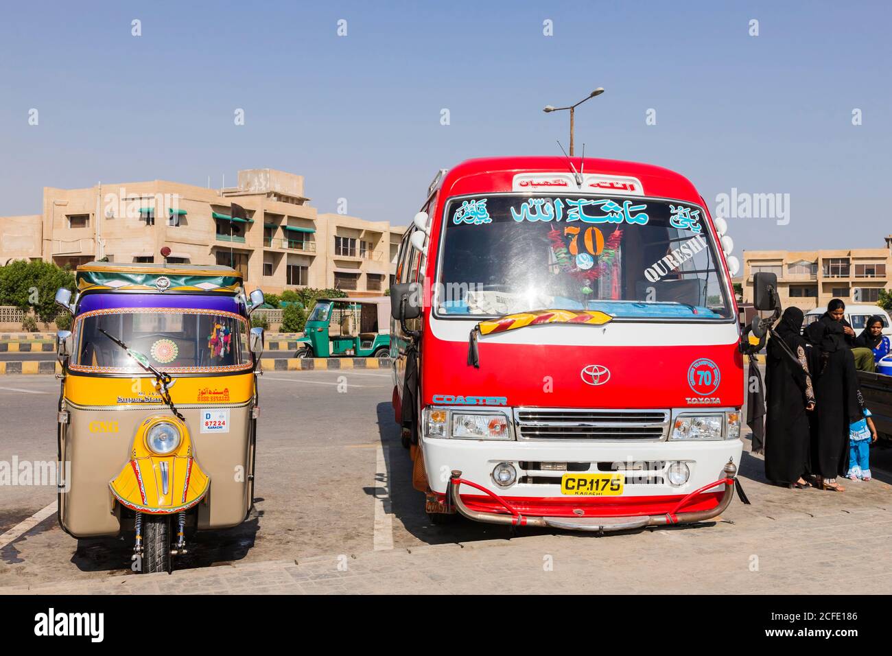 Tuk tuk and mini bus at Clifton Beach, local transportation, Karachi, Sindh, Pakistan, South Asia, Asia Stock Photo