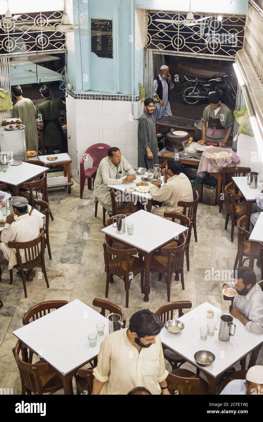 Local restaurant at downtown in city center, Karachi, Sindh, Pakistan, South Asia, Asia Stock Photo