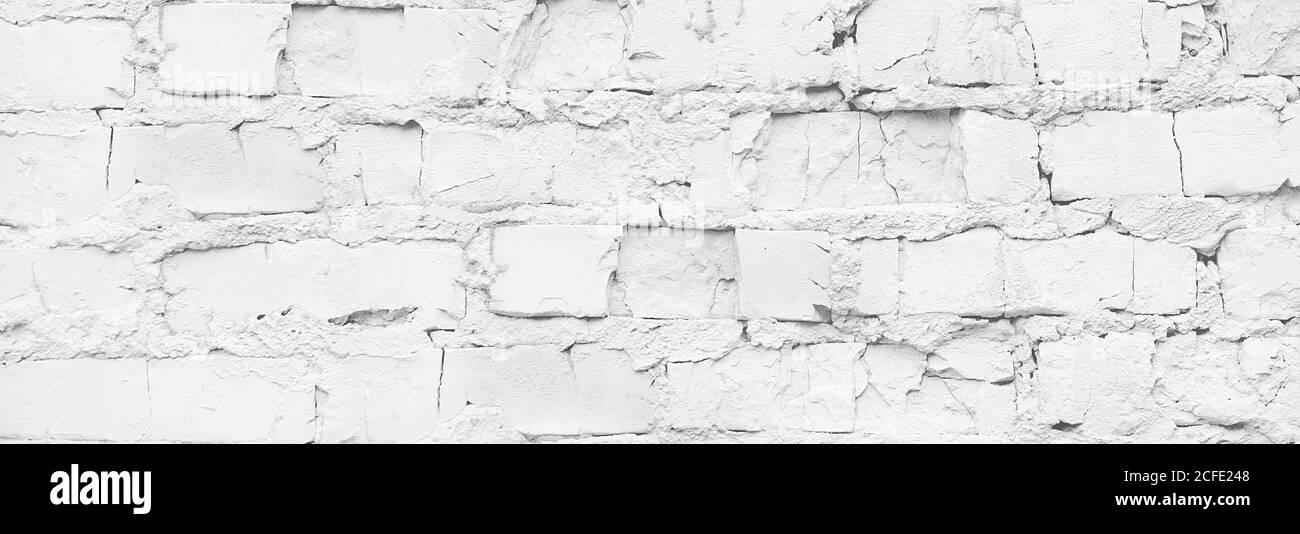 Close up white brick wall banner. Rough background Stock Photo - Alamy