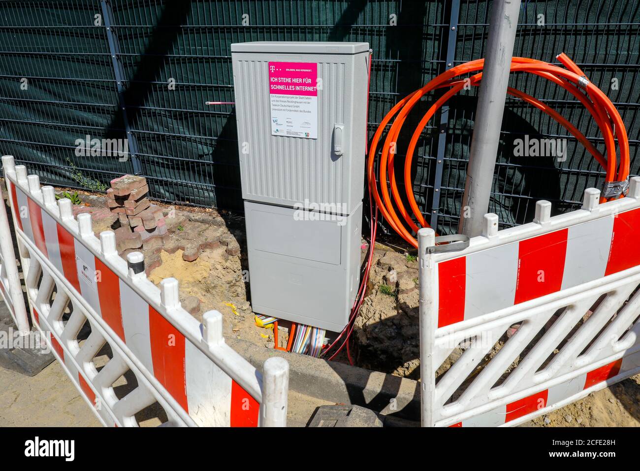 Telekom distribution box for fast internet, construction site DSL cable connection for households, Datteln, North Rhine-Westphalia, Germany Stock Photo