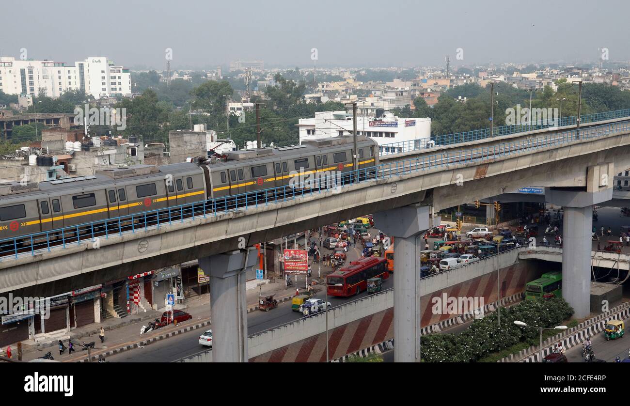 Delhi Metro train on track during trial run near Azadpur metro station on Yellow line between Samaypur Badli to Huda City Centre (42.3 km) with 37 intermediate metro stations in a first phase.Delhi Metro Rail Corporation (DMRC) is all set to resume its services for public from September 7th, 2020, after more than five months. In the wake of coronavirus pandemic, the government suspended the metro rail services in the last week of March. To avoid overcrowding at the stations, the Delhi Metro Rail Corporation on Wednesday released new guidelines for running metro rails. Stock Photo