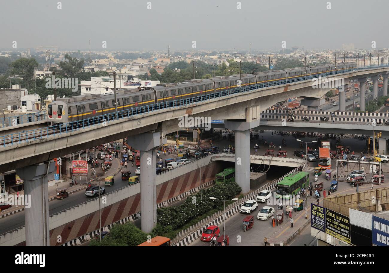 Delhi Metro train on track during trial run near Azadpur metro station on Yellow line between Samaypur Badli to Huda City Centre (42.3 km) with 37 intermediate metro stations in a first phase.Delhi Metro Rail Corporation (DMRC) is all set to resume its services for public from September 7th, 2020, after more than five months. In the wake of coronavirus pandemic, the government suspended the metro rail services in the last week of March. To avoid overcrowding at the stations, the Delhi Metro Rail Corporation on Wednesday released new guidelines for running metro rails. Stock Photo