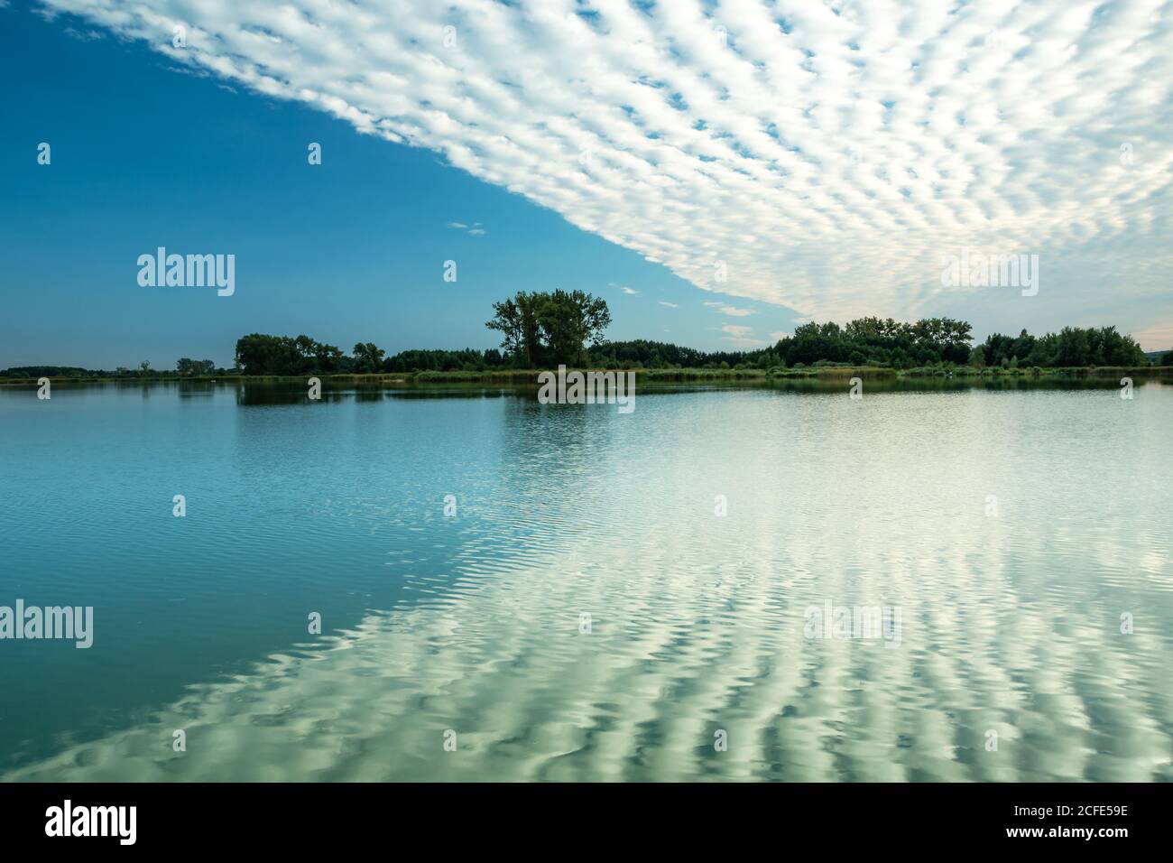 Sky blue reflected water background hi-res stock photography and images ...
