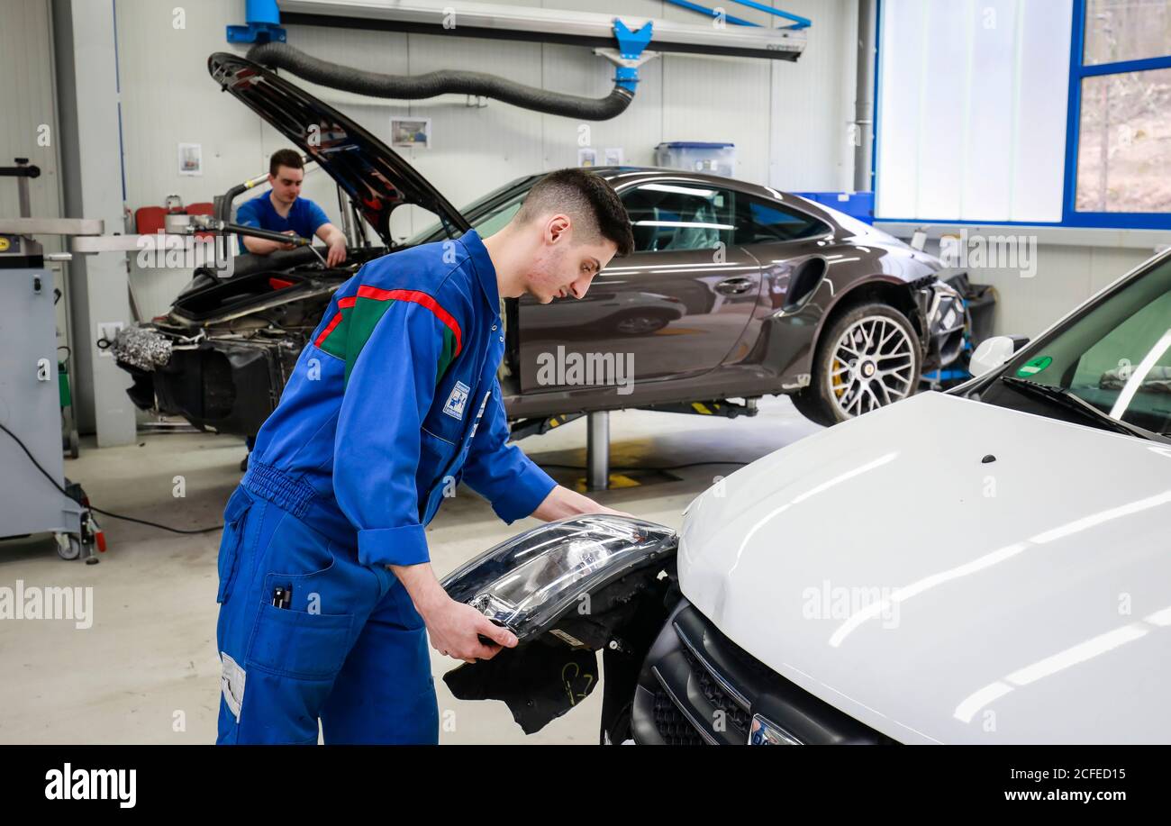 Ennepetal, North Rhine-Westphalia, Germany - Apprenticeship as body and vehicle construction mechanic, here at Frischkorn body + paint center. Stock Photo