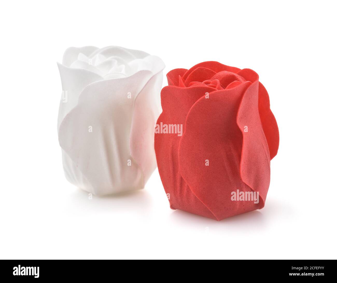Two rose flowers made of soap isolated on white Stock Photo