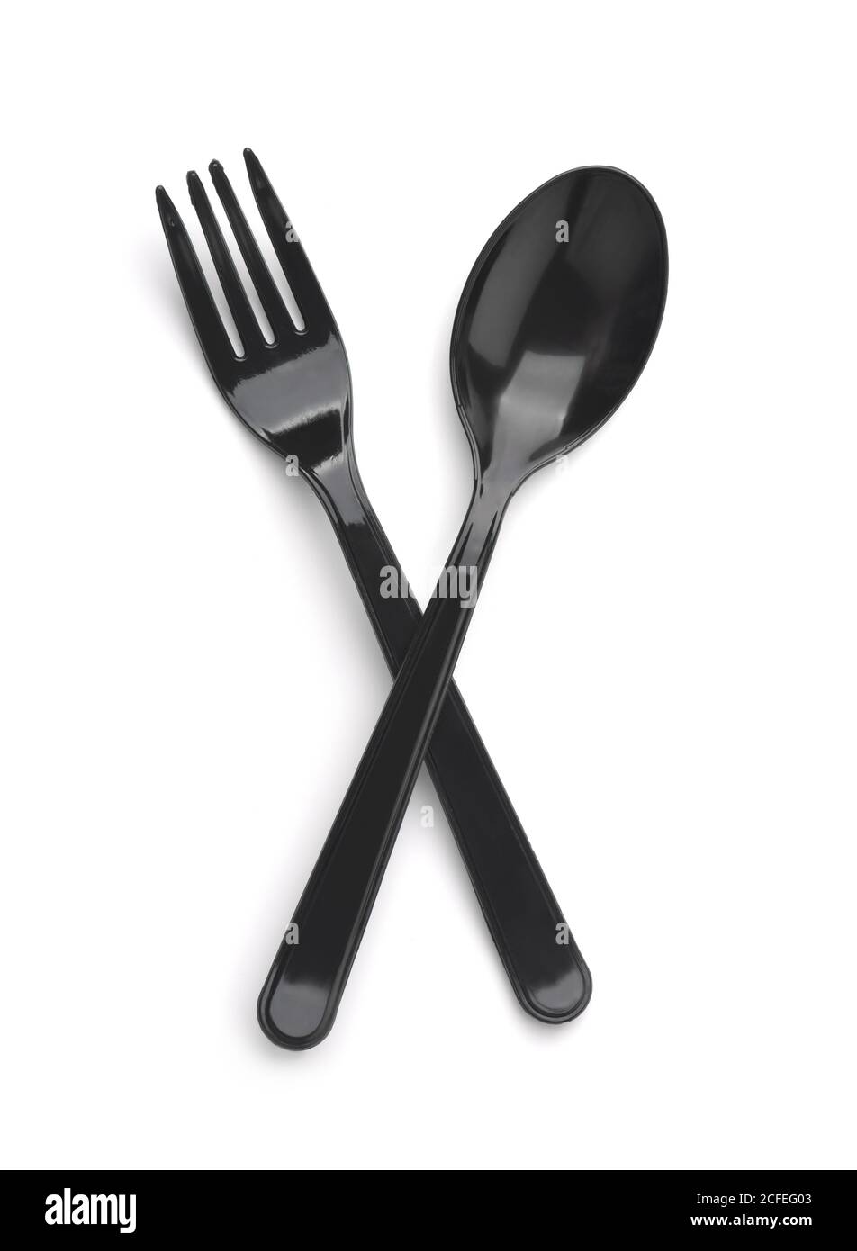 Top view of black plastic spoon and fork isolated on white Stock Photo