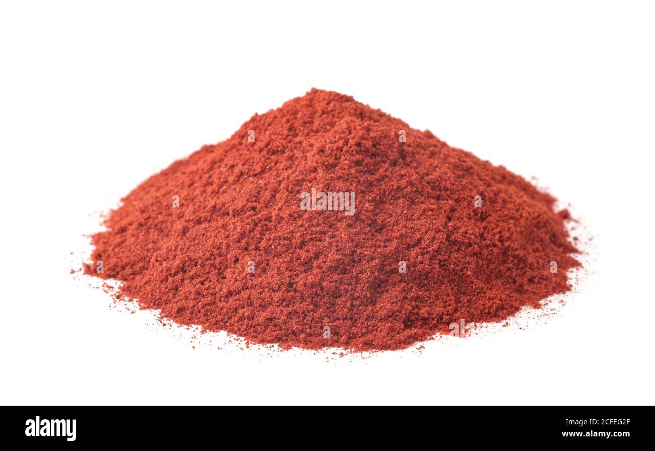 Pile of ground paprika isolated on white Stock Photo