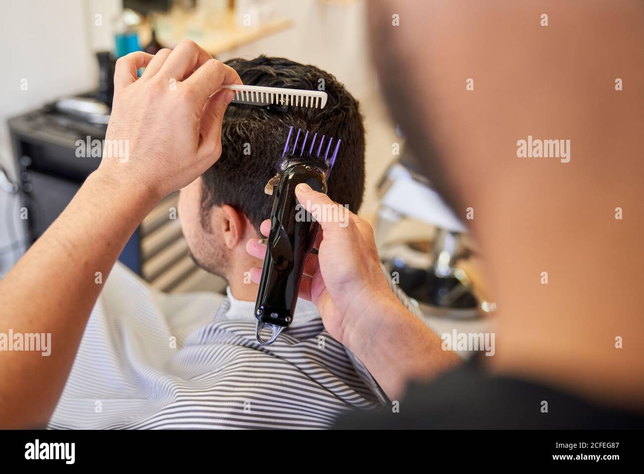 cutting hair with a machine