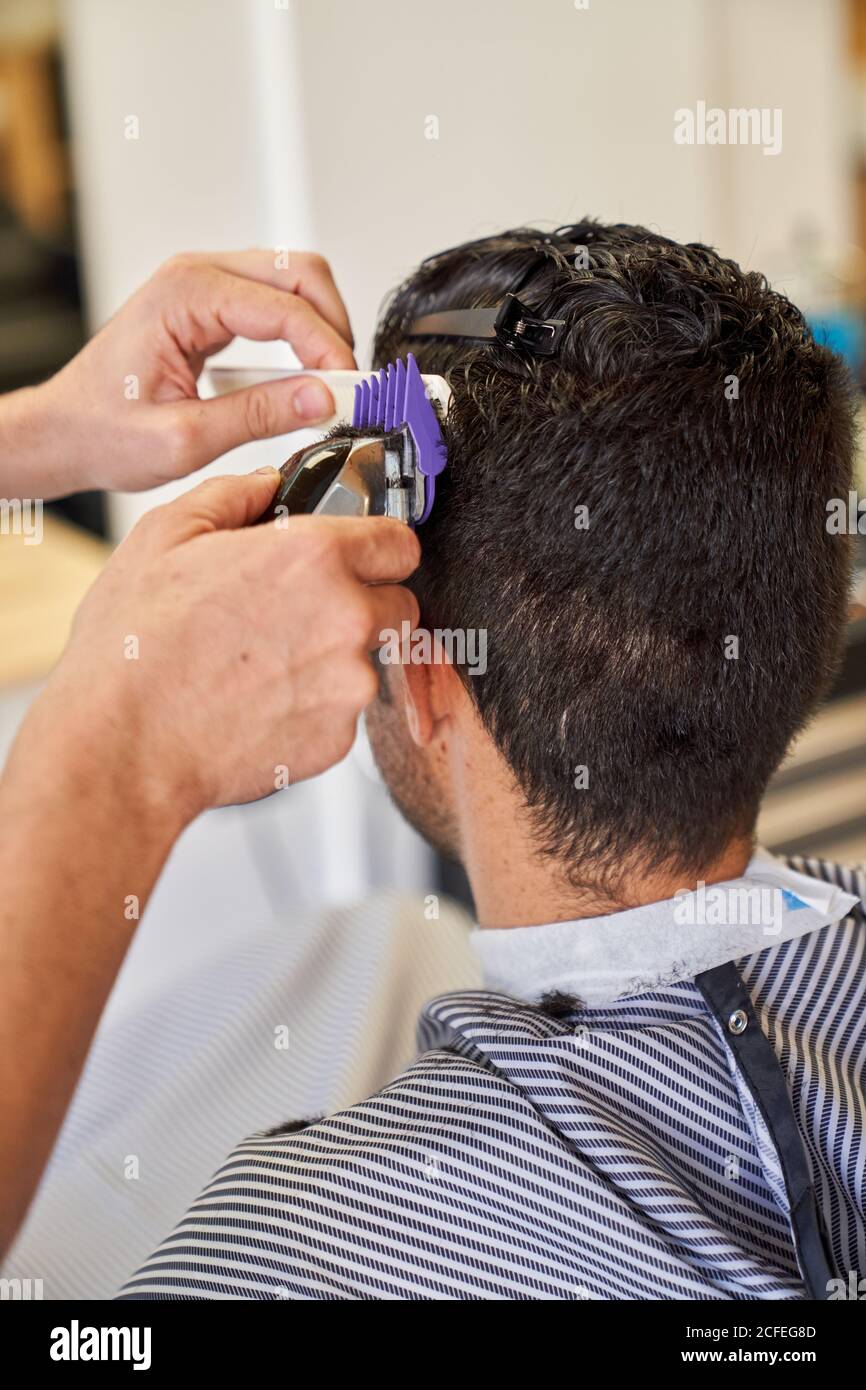 cutting hair with a machine