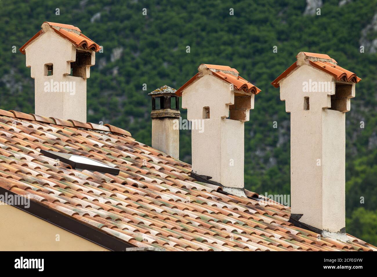 traditional chimneys on the roof, Abruzzo Stock Photo