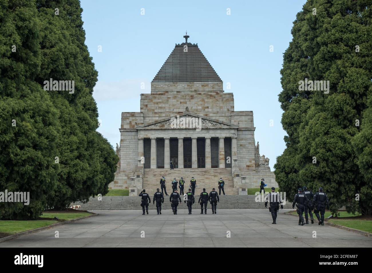 Melbourne, Australia 5 Sep 2020, Victorian Police Public Order Officers walk towards the shrine forecourt at the conclusion of the Freedom Day Anti-mask and anti lockdown protest at the Shrine of Remembrance in Melbourne Australia. Credit: Michael Currie/Alamy Live News Stock Photo