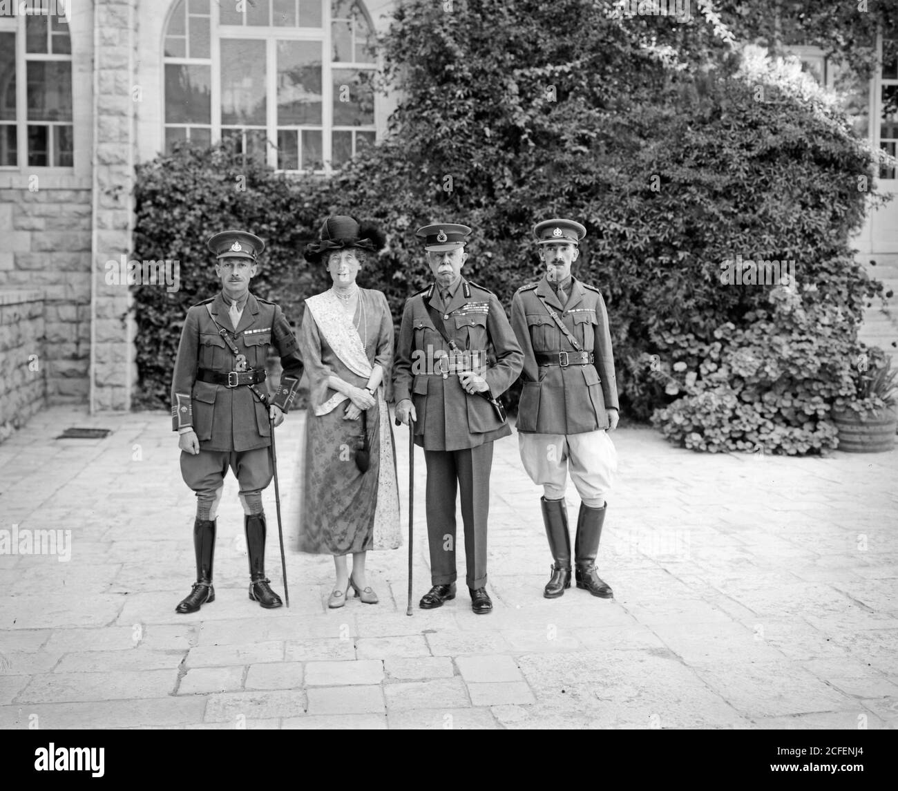 Original Caption:  Lord & Lady Plumer flanked by 2 officers  - Location: Jerusalem ca.  1925-1928 Stock Photo