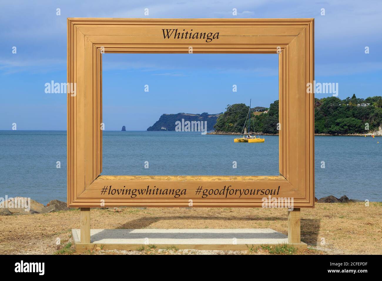 https://c8.alamy.com/comp/2CFEPDF/a-giant-frame-on-the-waterfront-in-whitianga-new-zealand-for-tourists-to-use-in-photos-2CFEPDF.jpg
