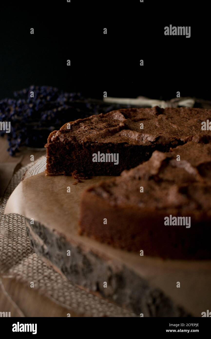 Beautiful delectable gluten free chocolate cake in a timber tabletop in the kitchen Stock Photo
