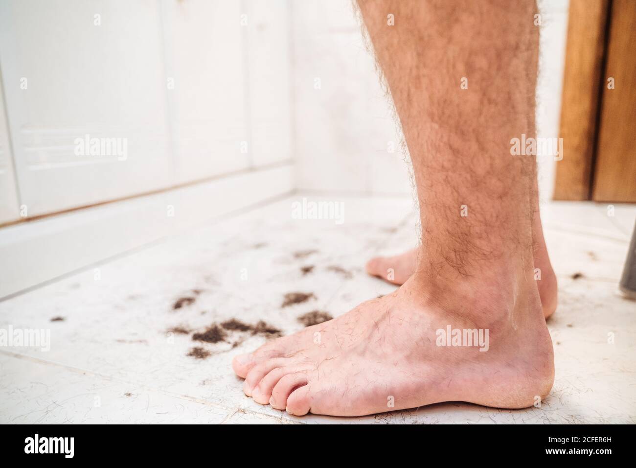 Sitting in chair barefoot hi-res stock photography and images - Alamy