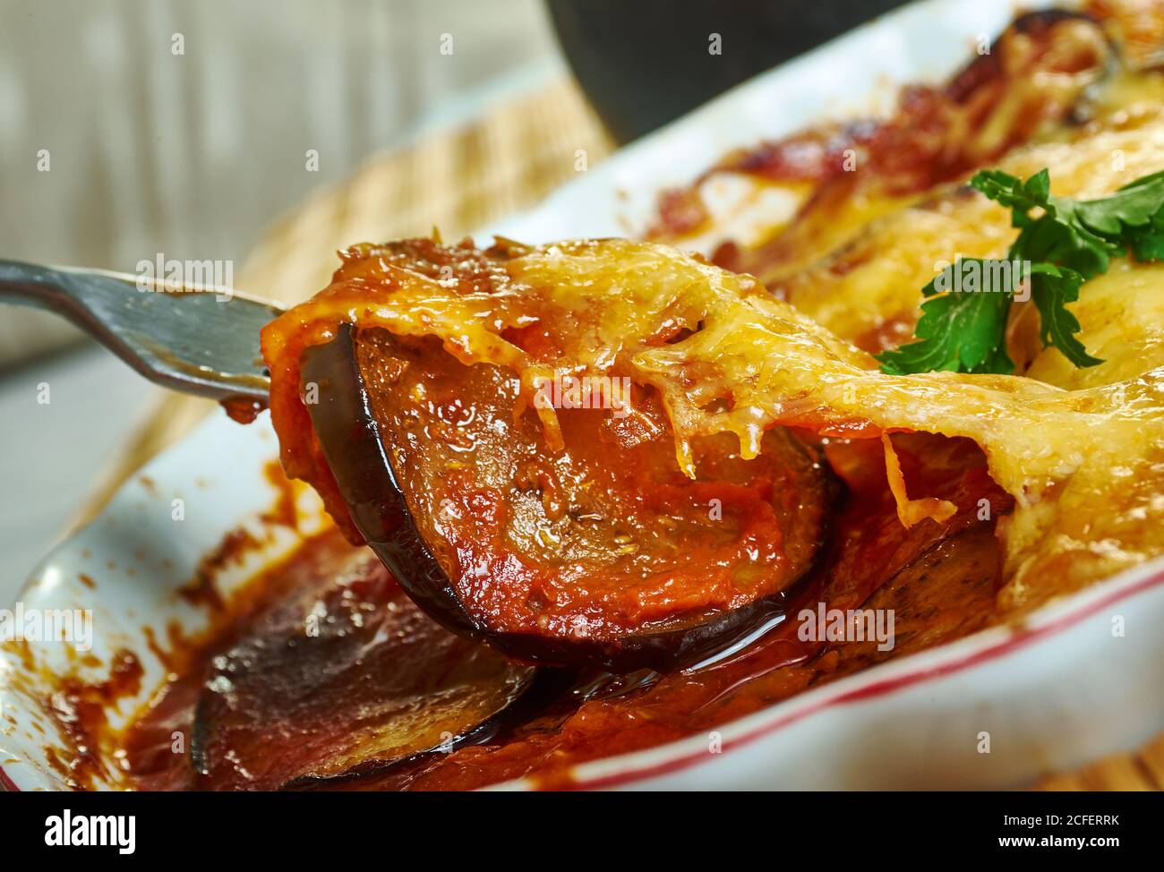 Parmigiana di melanzana Italian dish made with a shallow or deep